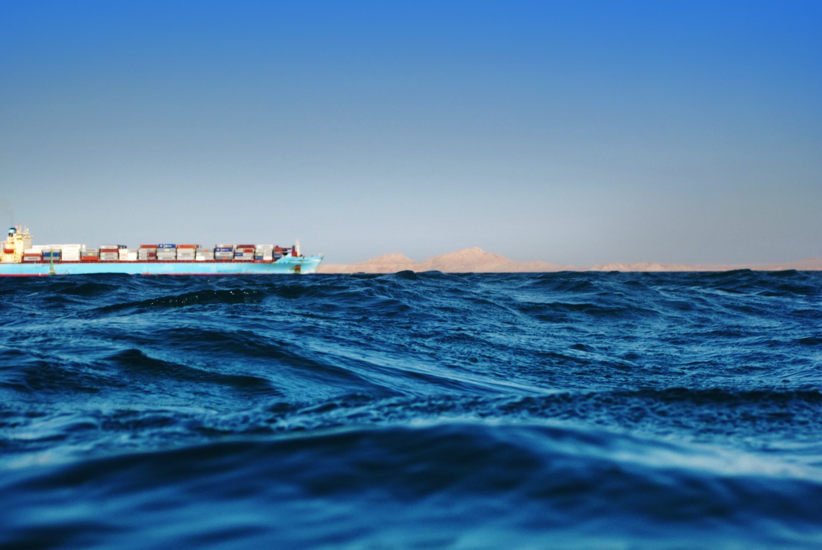 Red sea shipping ship at sea istock brunette 182363319
